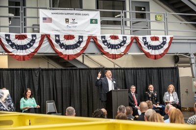 Photo of Frank Foti speaking at the Keel Laying Ceremony for the Maneuver Support Vessel (Light)